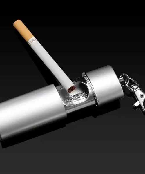 Cendrier de poche cylindrique ouvert repose-cigarette visible